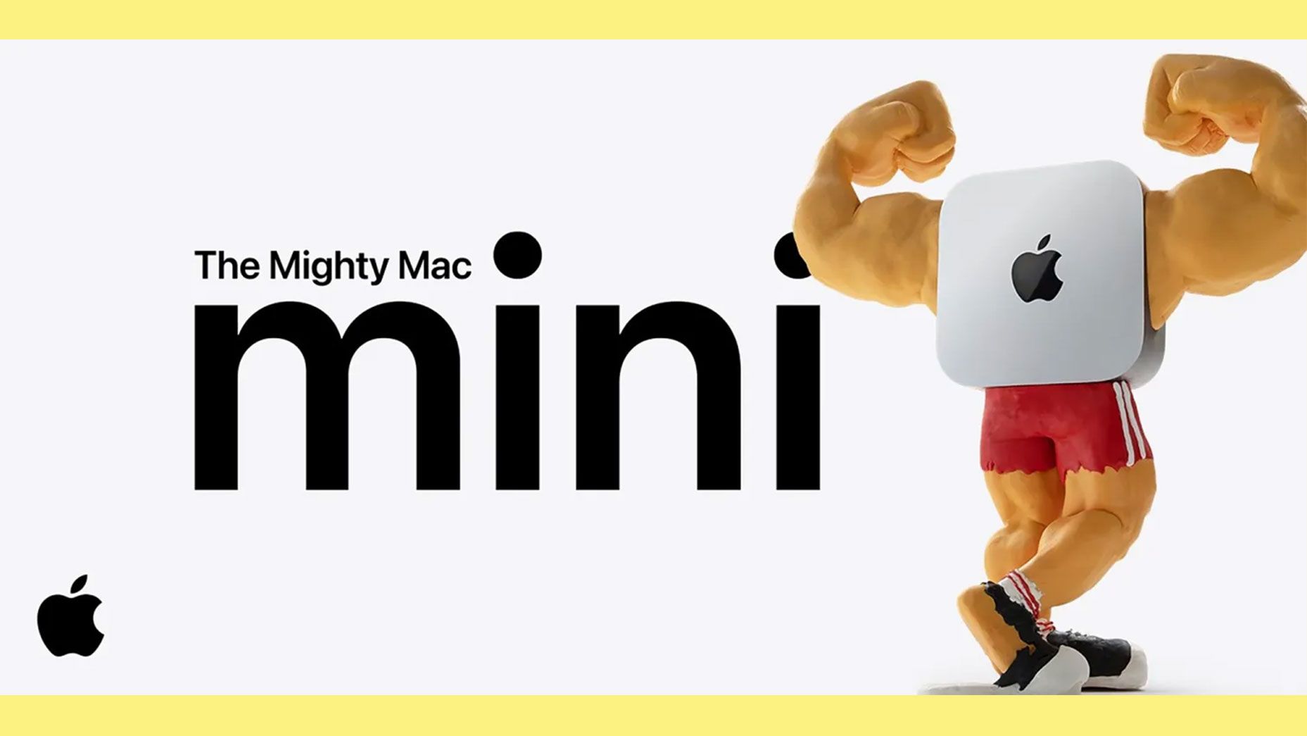 Still do comercial em stop-motion 'The Mighty Mac mini', com o boneco de cabeça em formato de Mac mini exibindo músculos em cenário minimalista